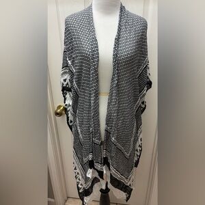 40. Women's Black and White Patterned Sweater